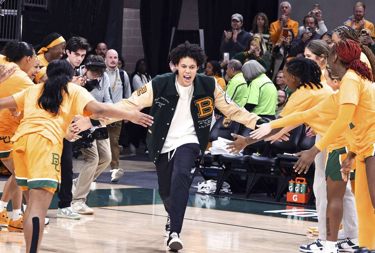 Former Baylor University legend and WNBA star Brittney Griner runs onto the court during her No ...