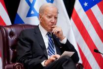 President Joe Biden listens as he and Israeli Prime Minister Benjamin Netanyahu participate in ...
