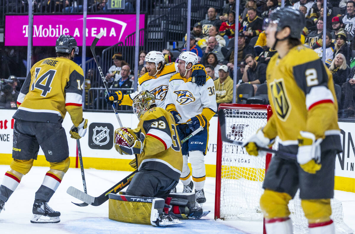 Golden Knights goaltender Adin Hill (33) has a shot get past by as the Nashville Predators left ...