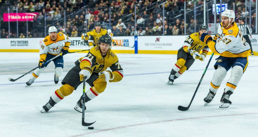 Golden Knights center William Karlsson (71) drives up t5he ice as Nashville Predators defensema ...