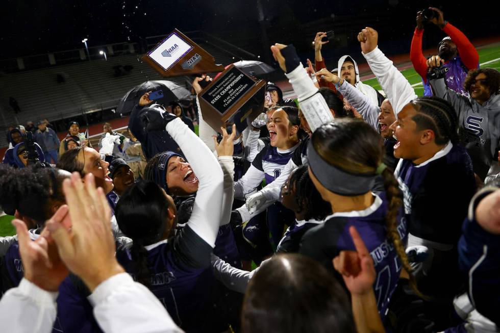 Shadow Ridge celebrates after winning the Class 5A flag football state championship game agains ...