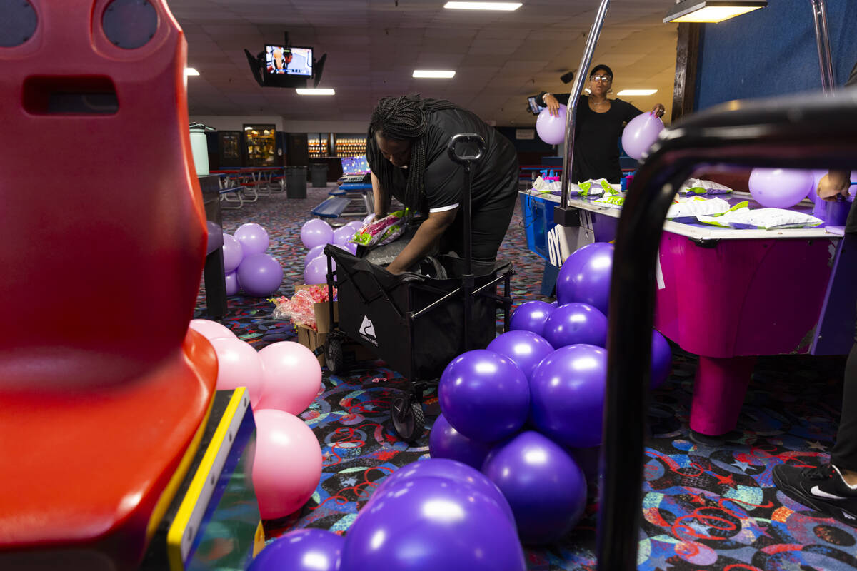 Las Vegas entrepreneur Jessica Washington, who owns Las Vegas Balloons, gets balloons prepared ...