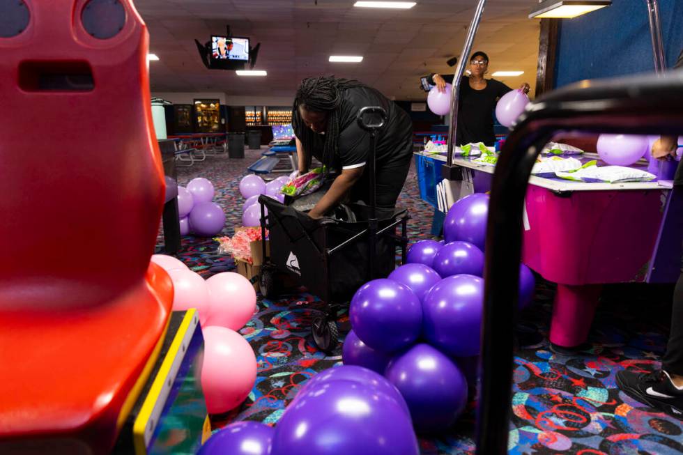 Las Vegas entrepreneur Jessica Washington, who owns Las Vegas Balloons, gets balloons prepared ...