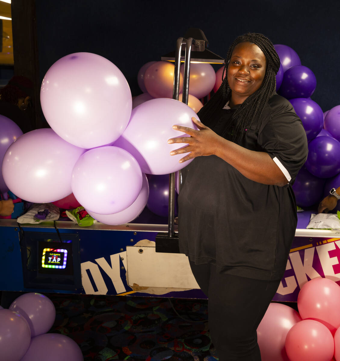 Las Vegas entrepreneur Jessica Washington, who owns Las Vegas Balloons, poses for a portrait wh ...