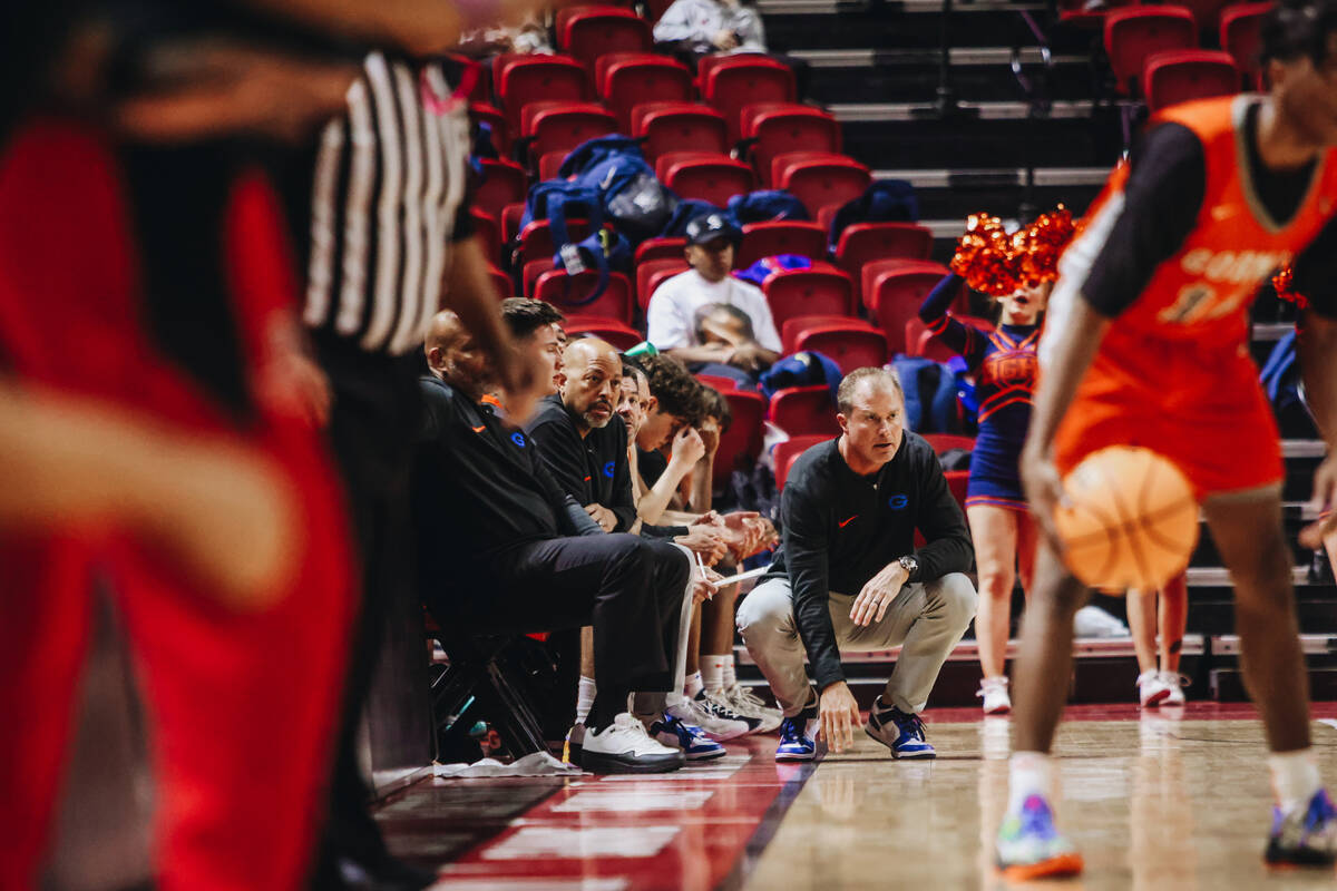 Bishop Gorman head coach Grant Rice watches his players during a Class 5A boys basketball state ...