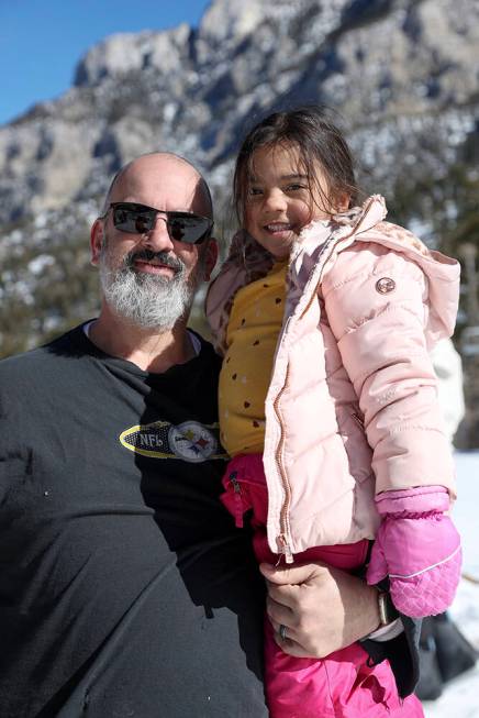 Duane Serge and his daughter, Sofia Serge, pose after youth ski and snowboard lessons at Lee Ca ...
