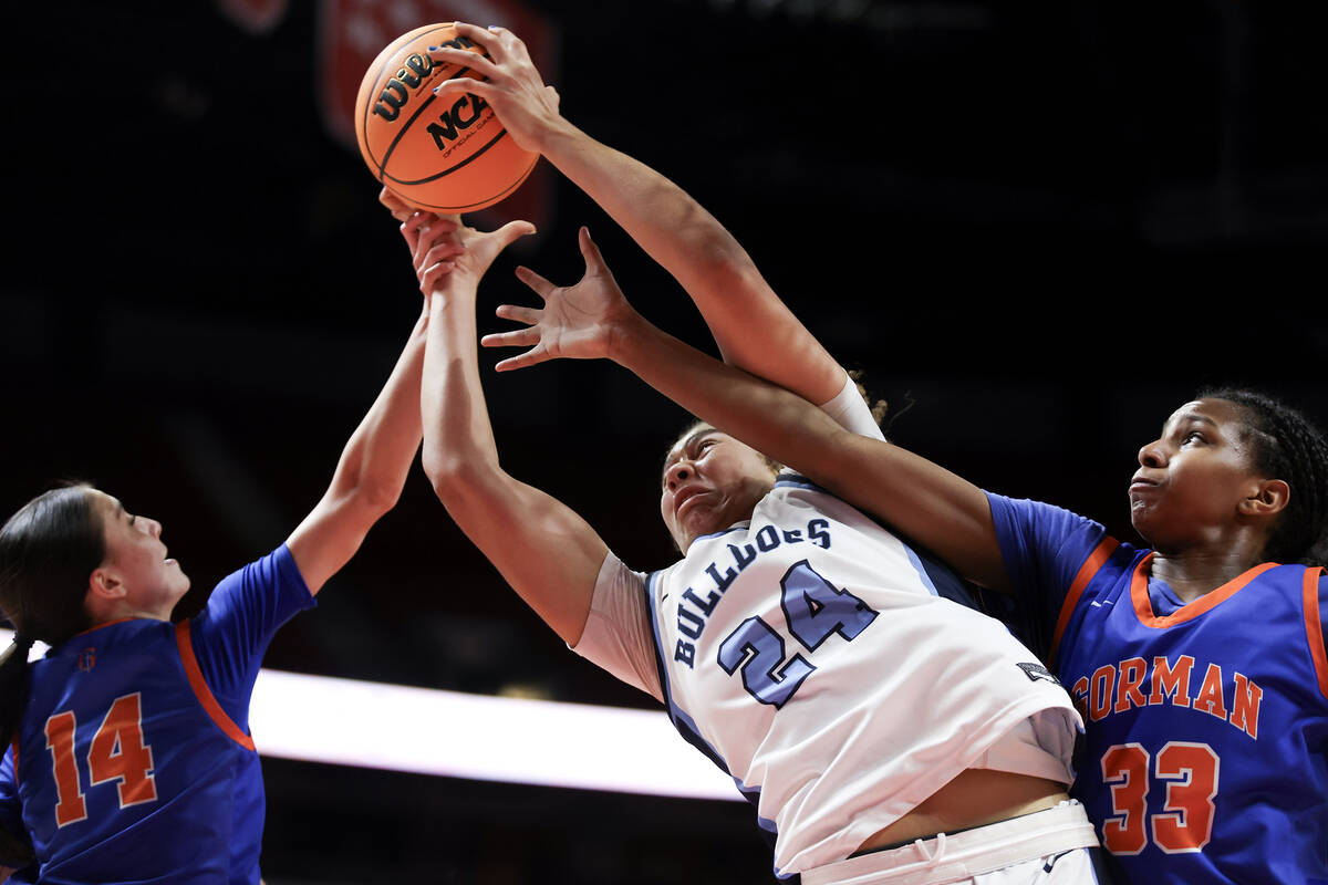 Centennial's Nation Williams (24) jumps for a rebound against Bishop Gorman's Kenzee Holton (14 ...
