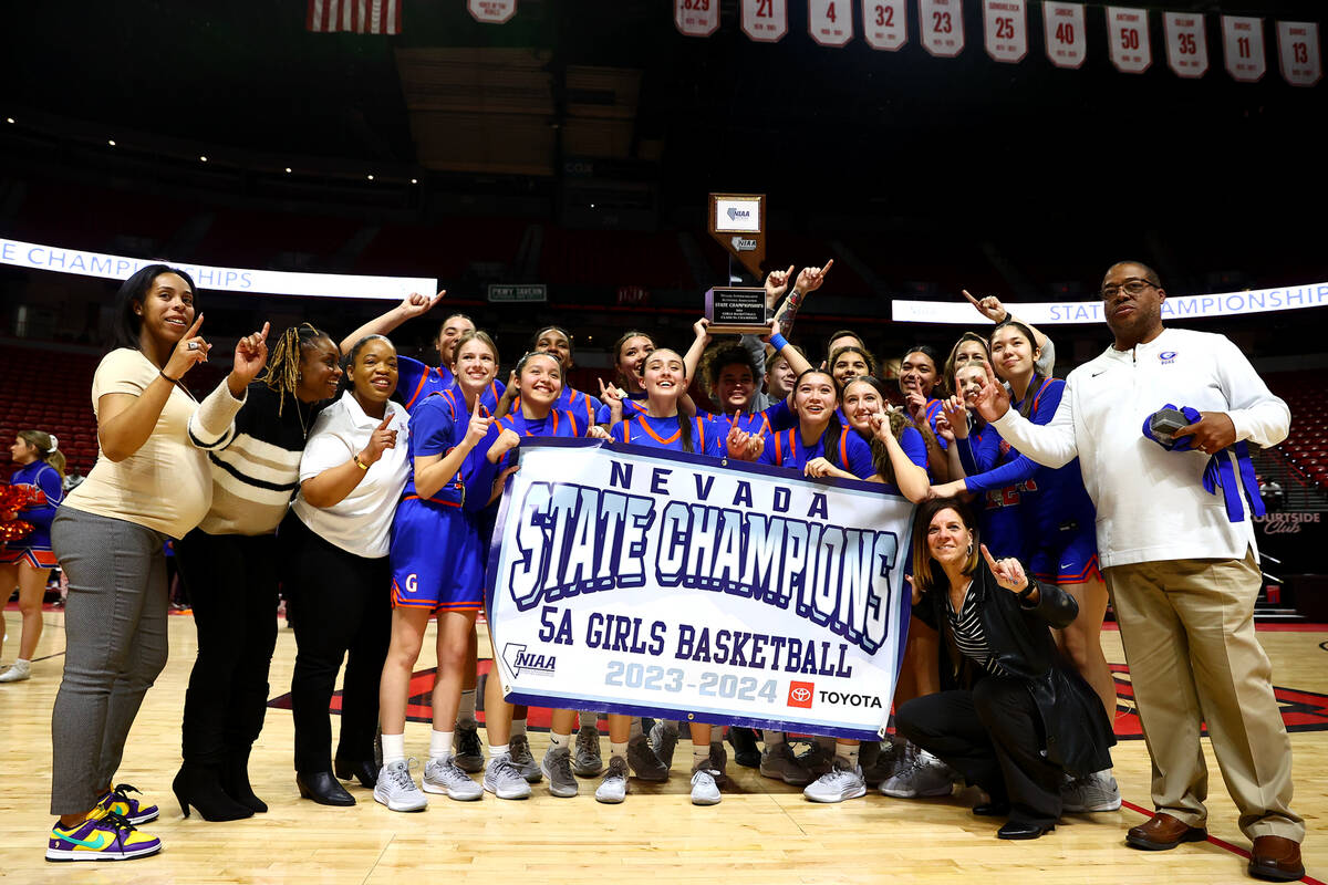 Bishop Gorman poses for photos after winning Class 5A girls basketball state championship game ...