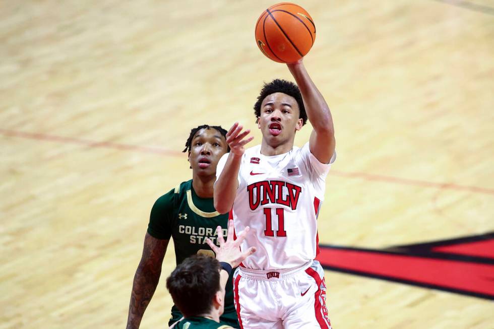 UNLV Rebels guard Dedan Thomas Jr. (11) shoots during the first half of an NCAA college basketb ...