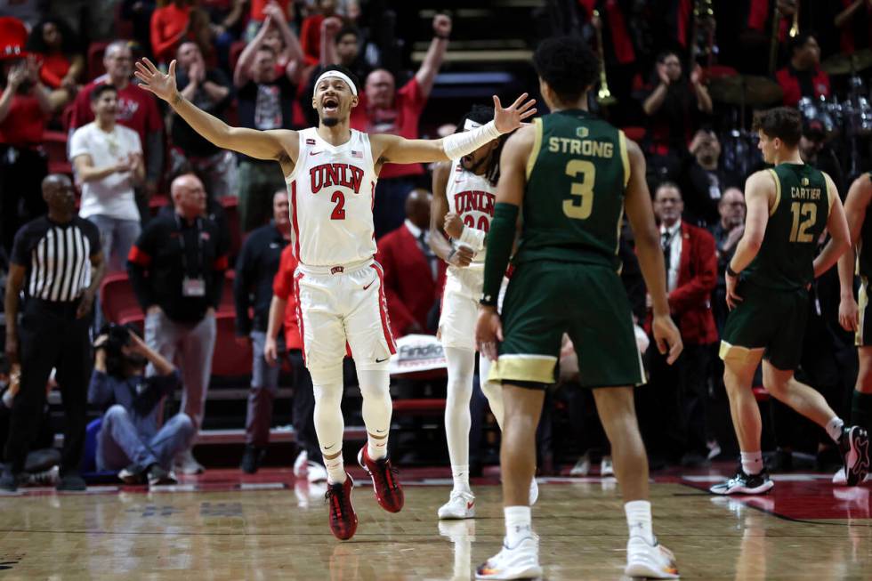 UNLV Rebels guard Justin Webster (2) celebrates as the clock runs out during the second half of ...