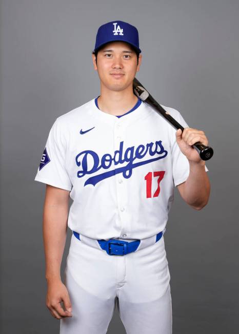 Los Angeles Dodgers designated hitter Shohei Ohtani poses for a photo during a spring training ...