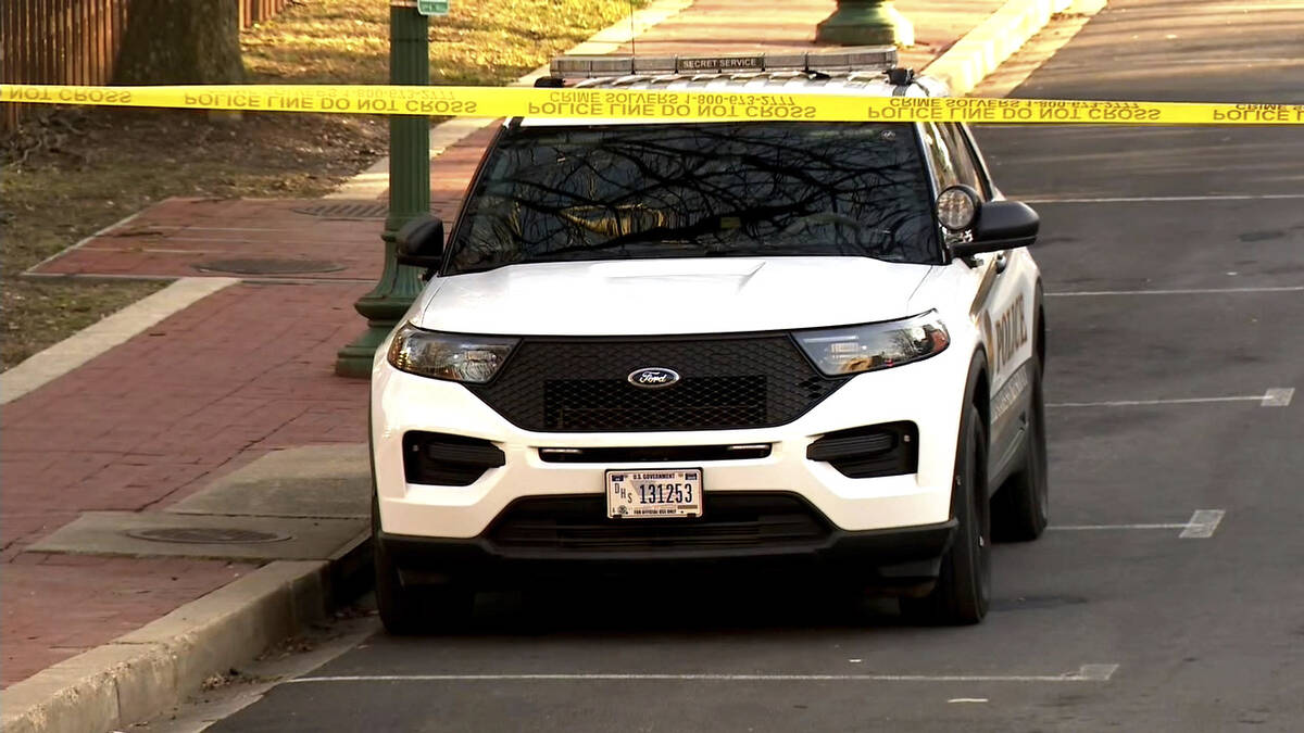 In this image taken from video, police are deployed outside the Israeli Embassy in Washington, ...