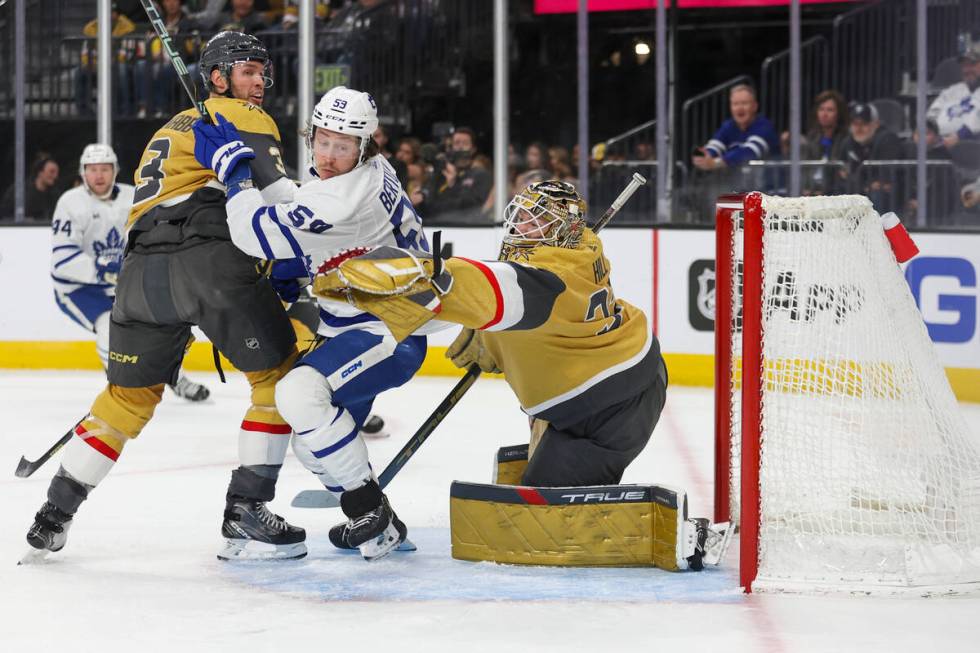 Vegas Golden Knights defenseman Brayden McNabb (3) and Toronto Maple Leafs right wing Easton Co ...