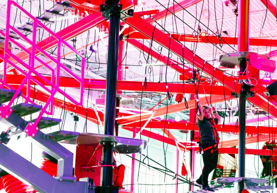 An employee inspects a sky rail at Spy Ninja HQ, the World's First YouTuber Theme Park, on Thur ...