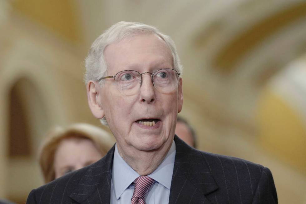 Senate Minority Leader Mitch McConnell, R-Ky., talks after a policy luncheon on Capitol Hill Tu ...