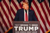 Former President Donald Trump speaks to a crowd at a caucus night watch party hosted by the Tru ...