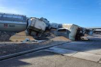 This photo shows some of 16 grain hoppers of a Union Pacific freight train that derailed Wednes ...