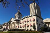 FILE - The Old Capitol and current Florida Capitol buildings are seen, Feb. 8, 2023, in Tallaha ...