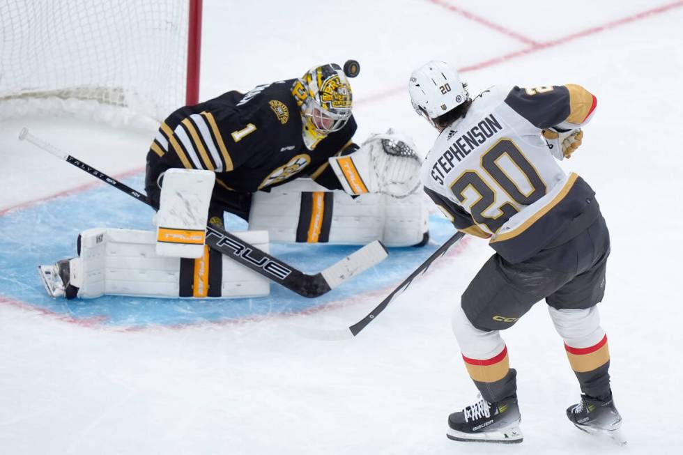 Vegas Golden Knights center Chandler Stephenson (20) scores as Boston Bruins goaltender Jeremy ...