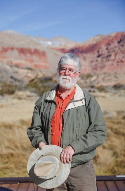Jim Boone, an ecologist and expert on local hiking trails and birding spots, poses for a portra ...