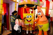 SpongeBob SquarePants and Patric Star greet guests as they enter SpongeBob's Crazy Carnaval Rid ...
