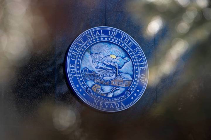 The Great Seal of the State of Nevada adorns the Nevada Legislature building during the 82nd Se ...