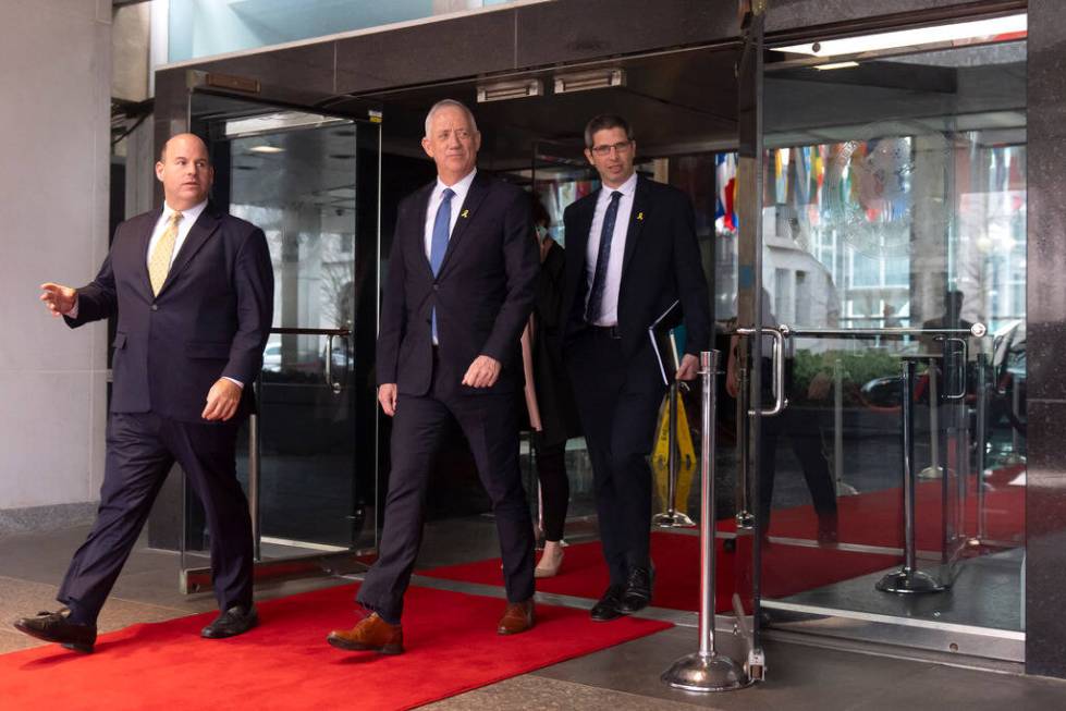 Benny Gantz, center, a key member of Israel's War Cabinet and the top political rival of Israel ...