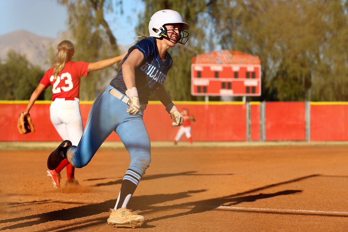 Centennial's Ashley Madonia (3) rounds third base during a high school softball game against Ce ...