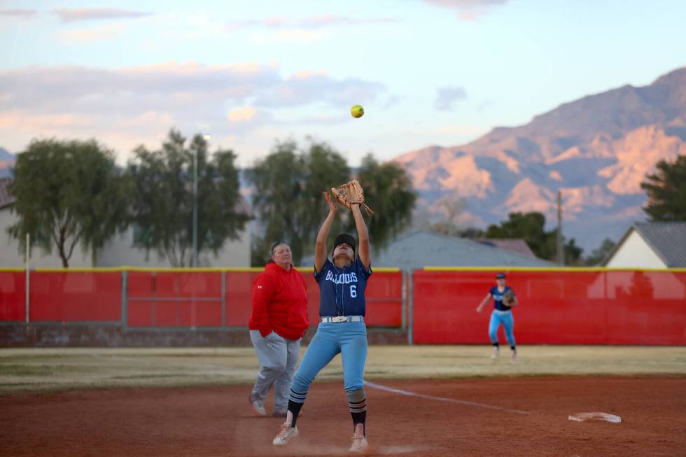 Centennial's Leeah Ibarra (6) prepares to catch for an out over Arbor View during a high school ...