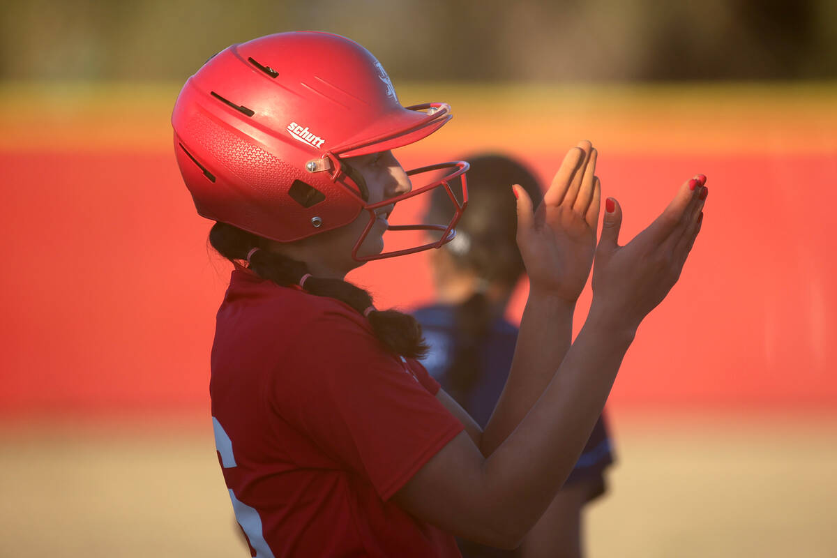 Arbor View shortstop Madilyn Lowy celebrates after hitting a triple during a high school softba ...