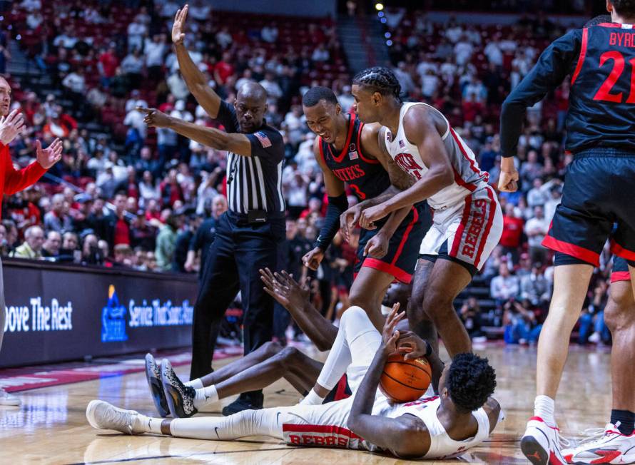 UNLV forward Kalib Boone (10) calls a late timeout as San Diego State Aztecs guard Micah Parris ...