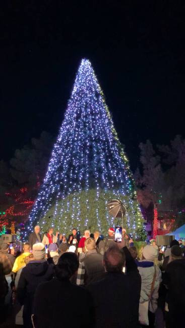 Opportunity Village's 65-foot Christmas tree at a tree lighting ceremony before wind storms hit ...