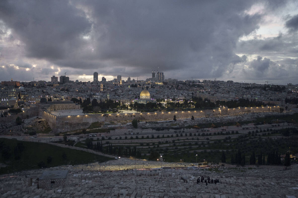 A view of the Dome of the Rock shrine at the Al Aqsa Mosque compound during dusk, ahead of Rama ...