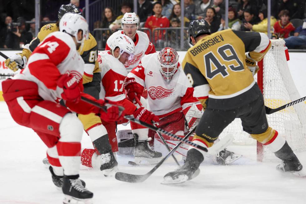 Golden Knights center Ivan Barbashev (49) attempts to score on Red Wings goaltender James Reime ...