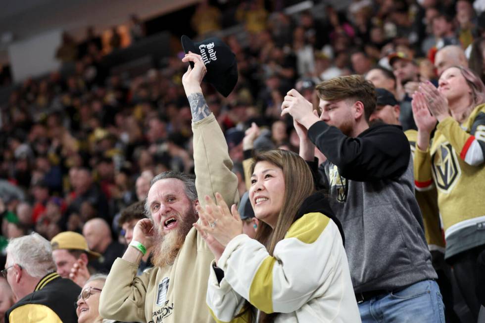 Golden Knights celebrate after a score during the first period of an NHL hockey game against th ...