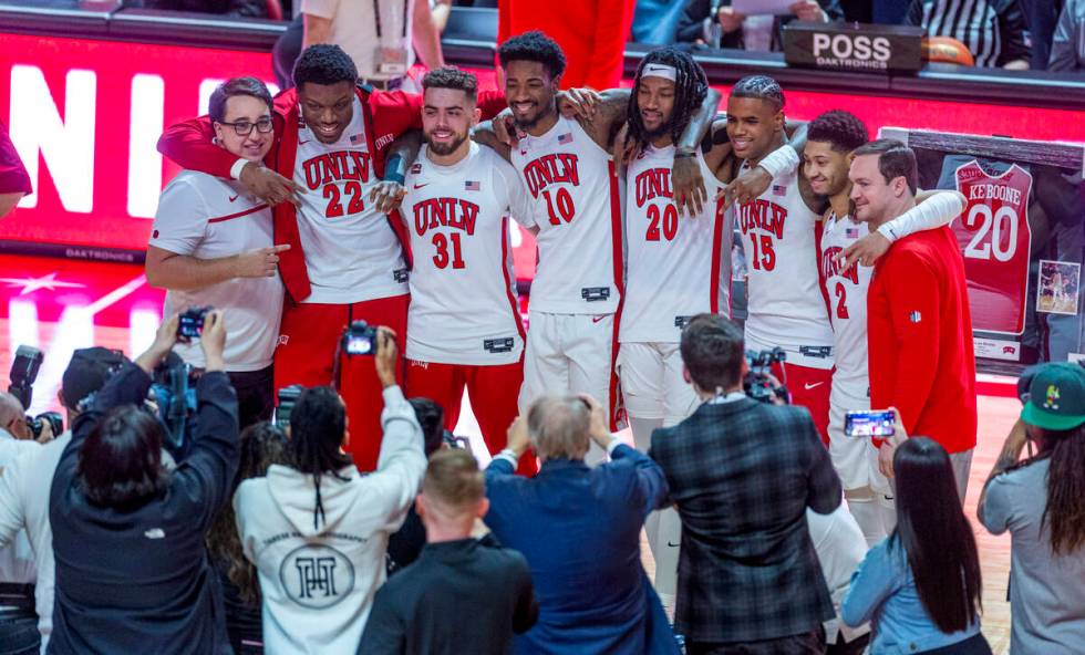 UNLV senior players gather together before the first half of their NCAA men's basketball game a ...