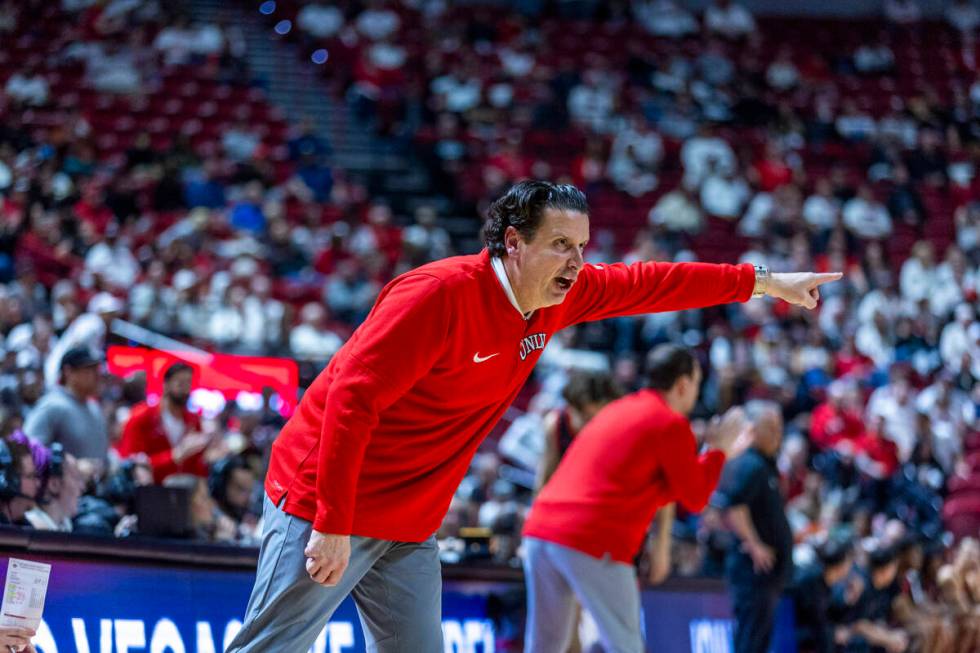 UNLV assistant coach Kevin Kruger Barret Peery directs his players against the San Diego State ...