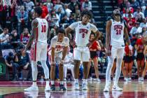 UNLV players are spent as the game nears an end against the San Diego State Aztecs during the s ...