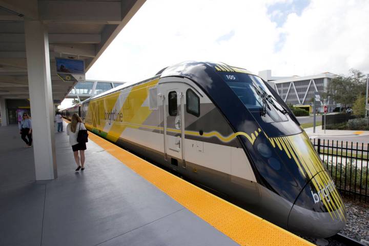 A Brightline train is shown at a station in Fort Lauderdale, Fla., on Jan. 11, 2018. (AP Photo/ ...