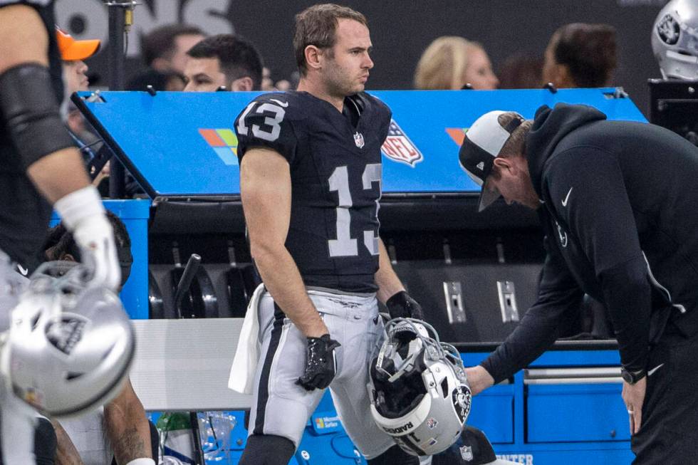 Raiders wide receiver Hunter Renfrow (13) watches the team play from the sideline during the se ...