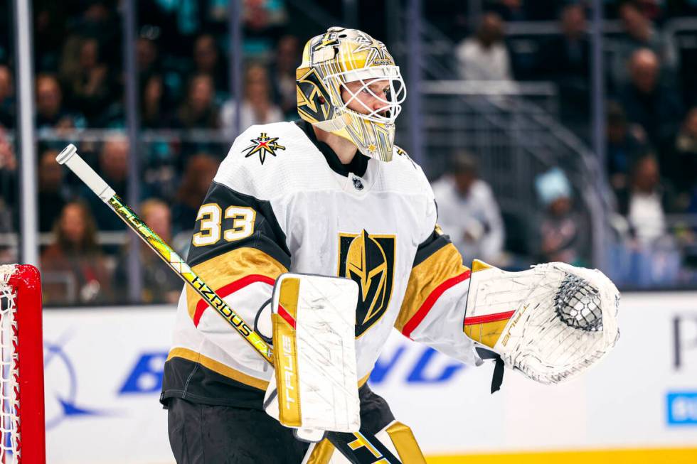 Seattle Kraken goaltender Philipp Grubauer looks back at the puck in the net as Vegas Golden Kn ...