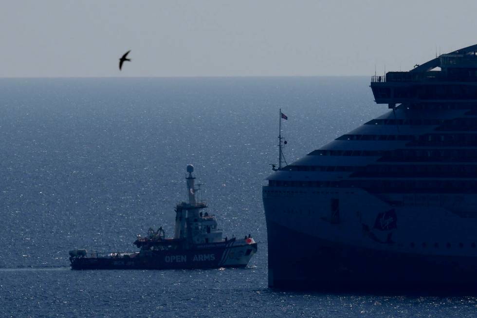 The ship belonging to the Open Arms aid group, towing a barge carrying 200 tons of rice and flo ...