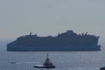 The ship belonging to the Open Arms aid group, towing a barge carrying 200 tons of rice and flo ...