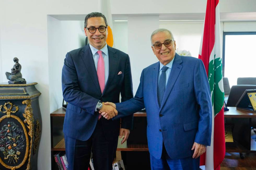 Lebanese Foreign Minister Abdallah Bouhabib, right, welcomes Cyprus Foreign Minister Constantin ...