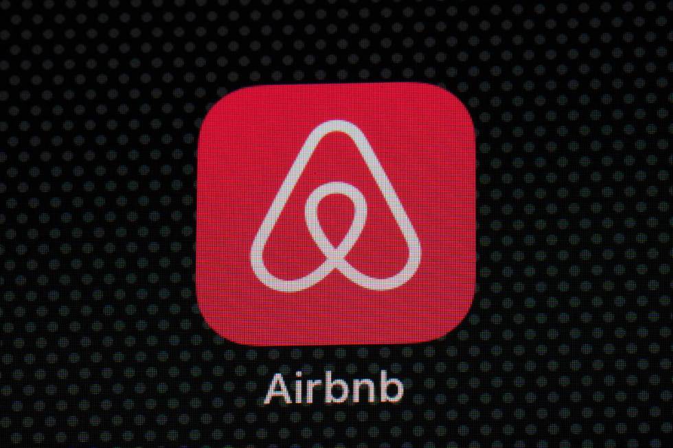 The Airbnb app icon is displayed on an iPad screen in Washington, D.C., on May 8, 2021. Airbnb ...