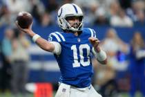 Indianapolis Colts quarterback Gardner Minshew throws a pass during the first half of an NFL fo ...
