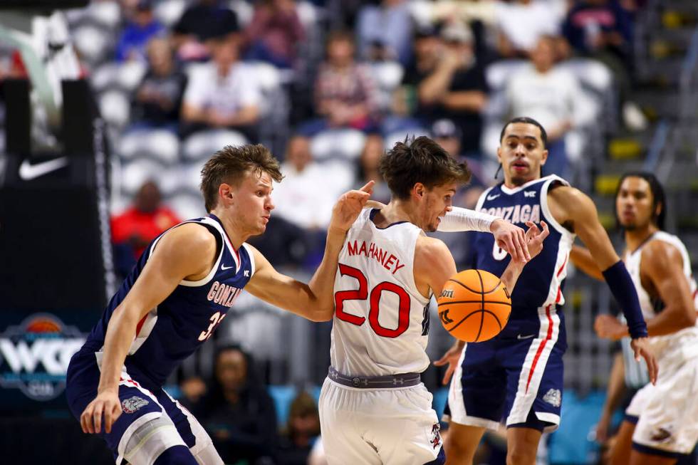 St. Mary's Gaels guard Aidan Mahaney (20) loses control of the ball while Gonzaga Bulldogs forw ...