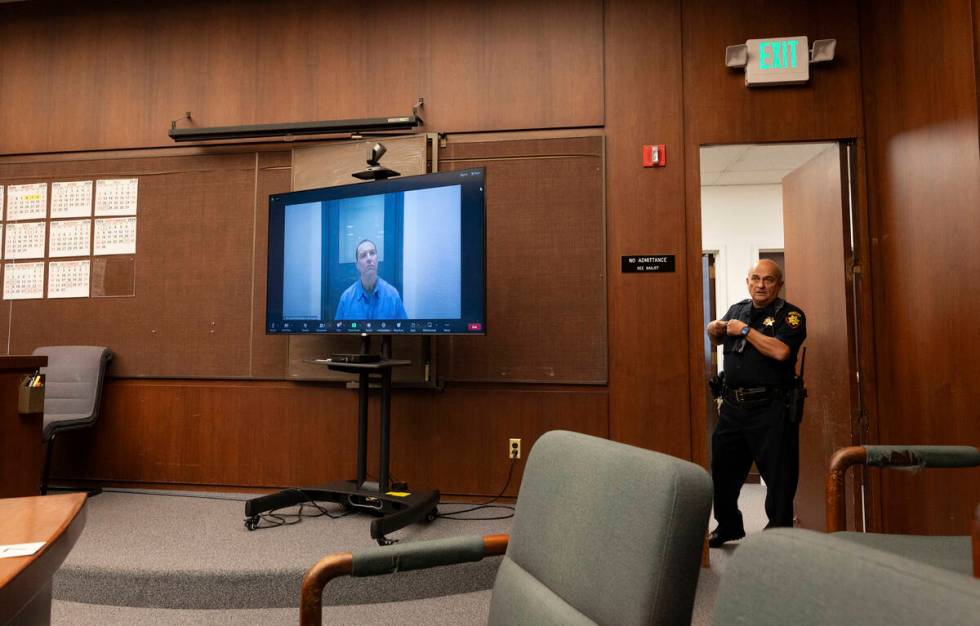 Scott Peterson appears on a video call from Mule Creek State Prison during a status conference ...