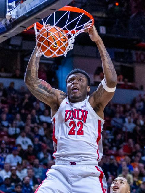 UNLV Rebels forward Karl Jones (22) dunks the ball against the nSan Diego State Aztecs during t ...