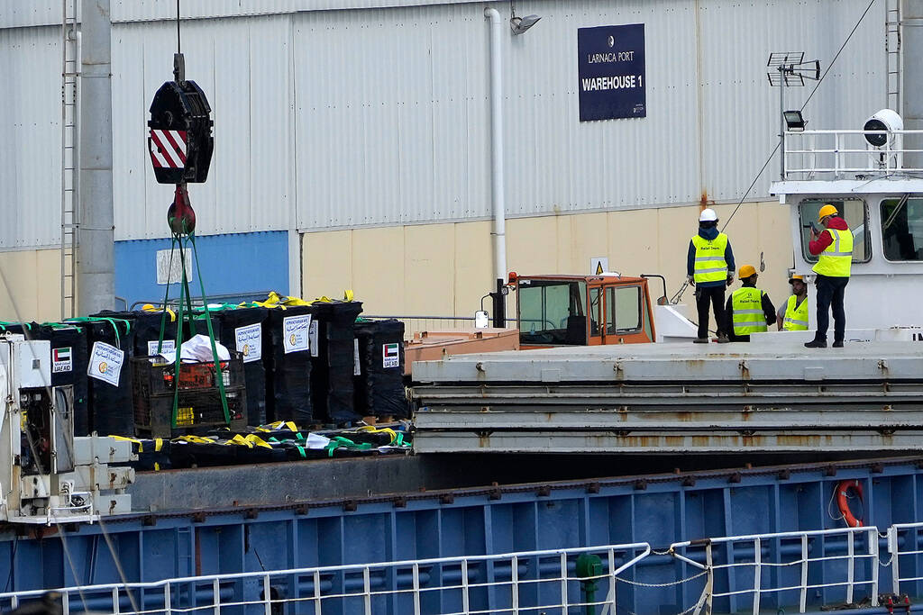 Food aid, left on the pallets, from the U.S. charity World Central Kitchen and the United Arab ...